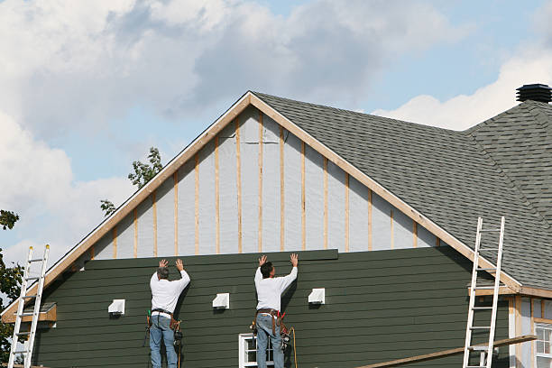 Professional Siding Contractor technician working in Monroe, NC